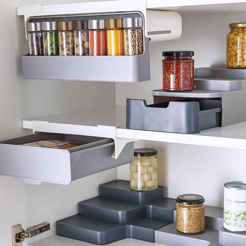 Kitchen cabinet with pull-out shelves and spice containers