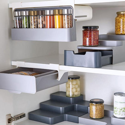 Kitchen cabinet with pull-out shelves and spice containers